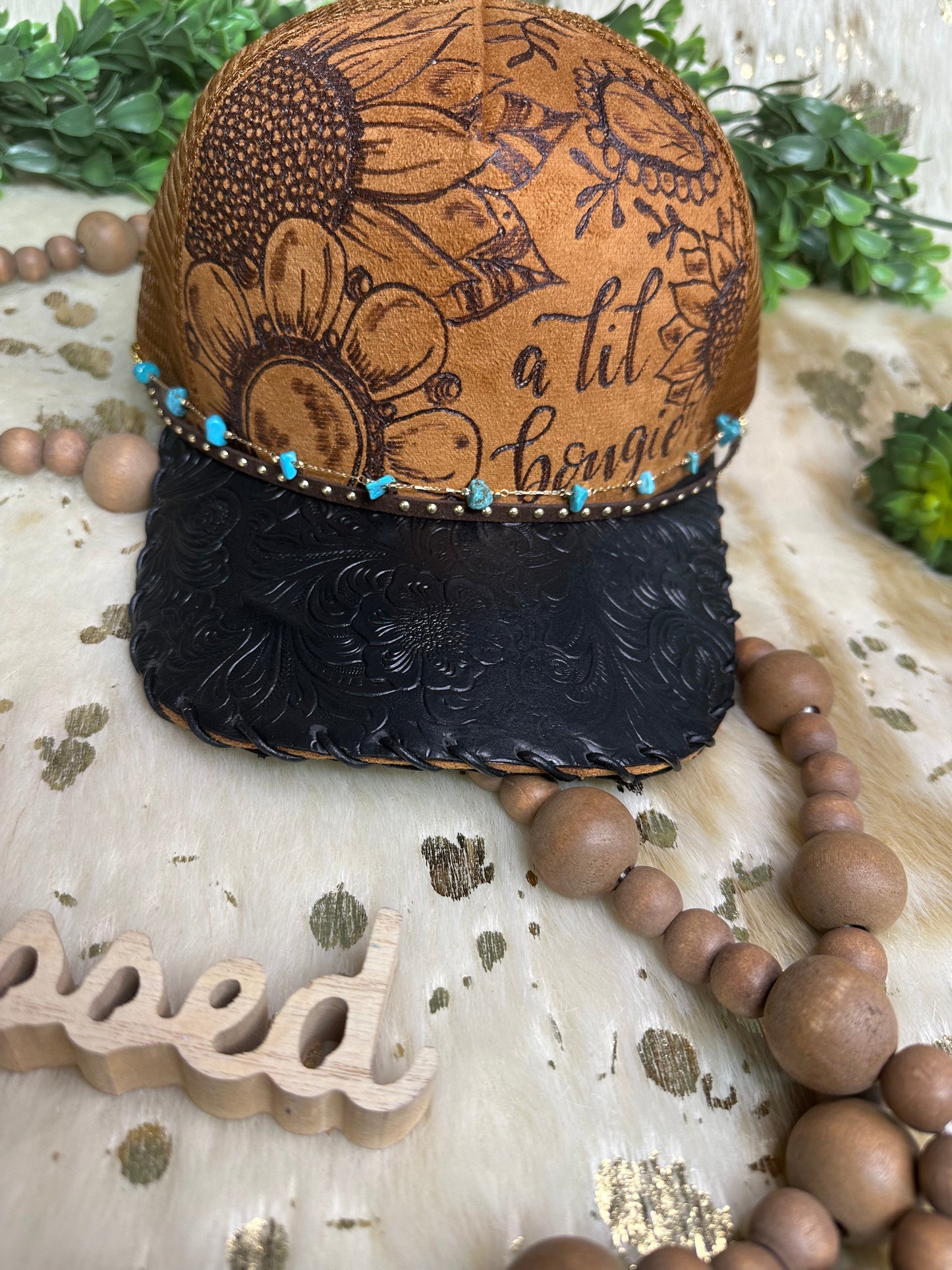 A lil Bougie Cowgirl hand burned Sunflower mesh back trucker hat