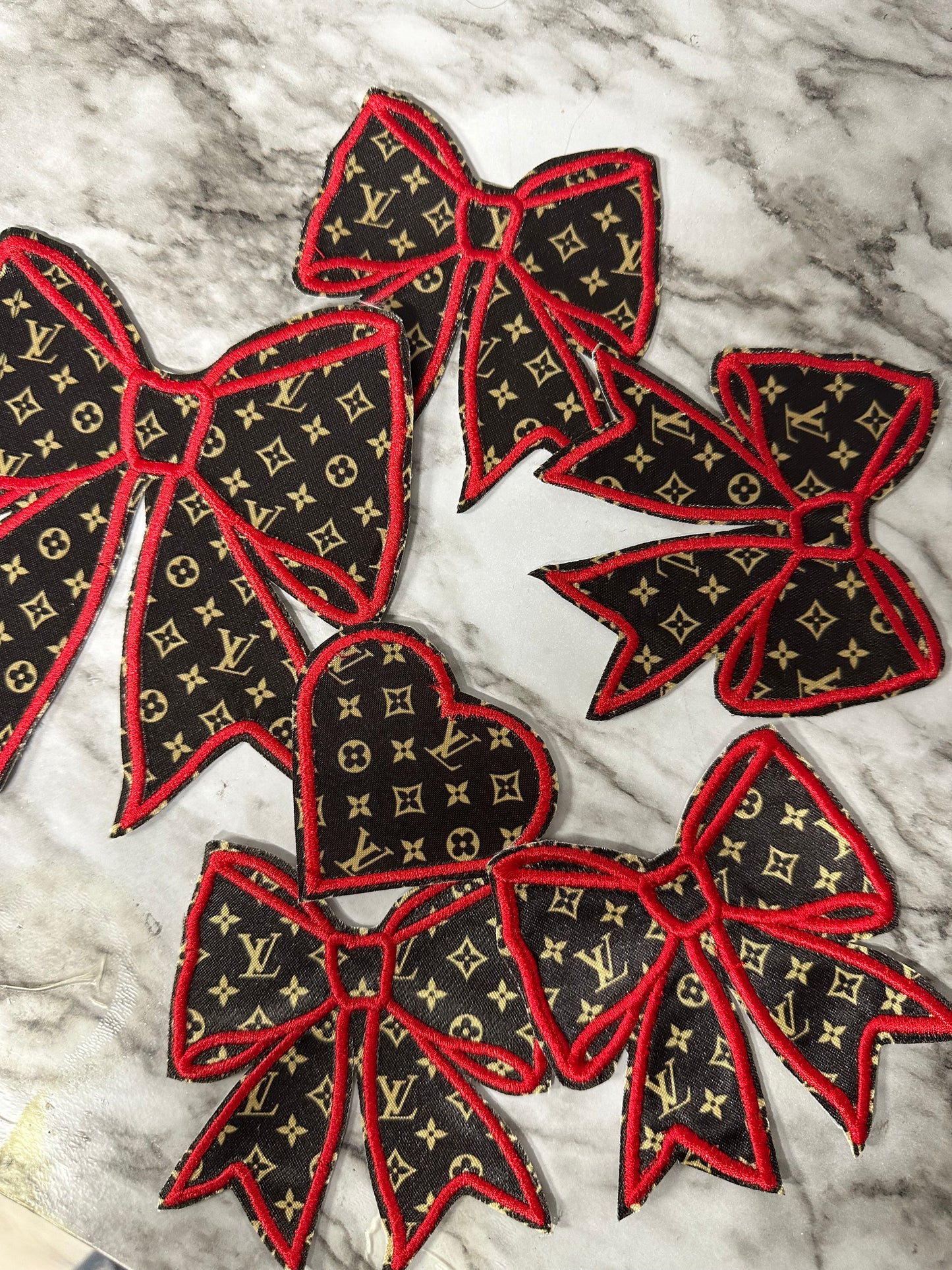 LV designer collection bows and filler patches