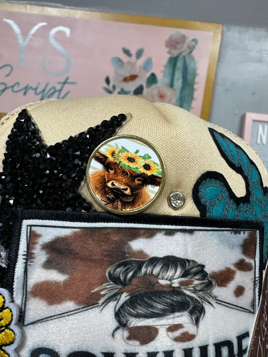 Sunflower Highland cow round pin