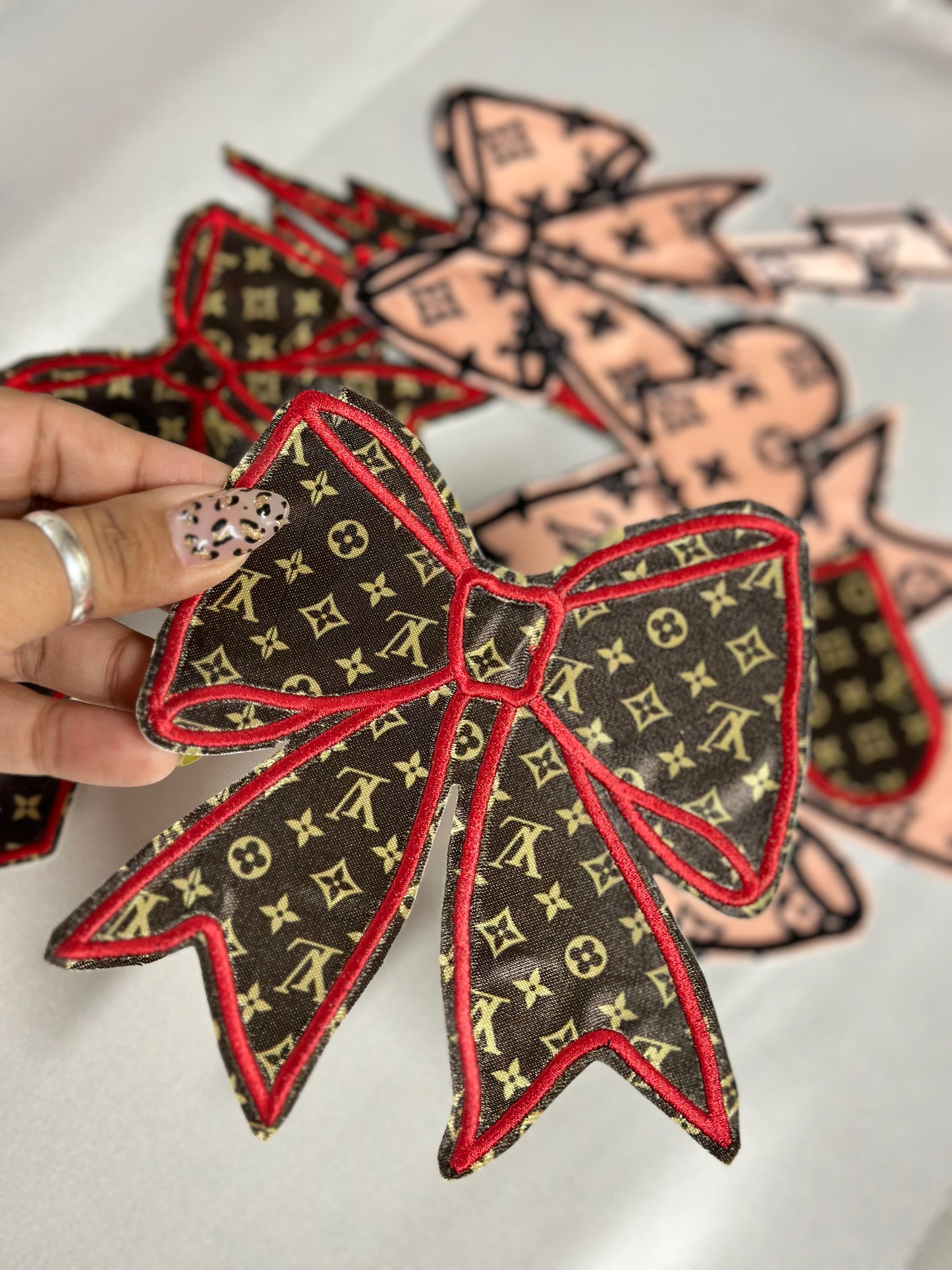 LV designer collection bows and filler patches