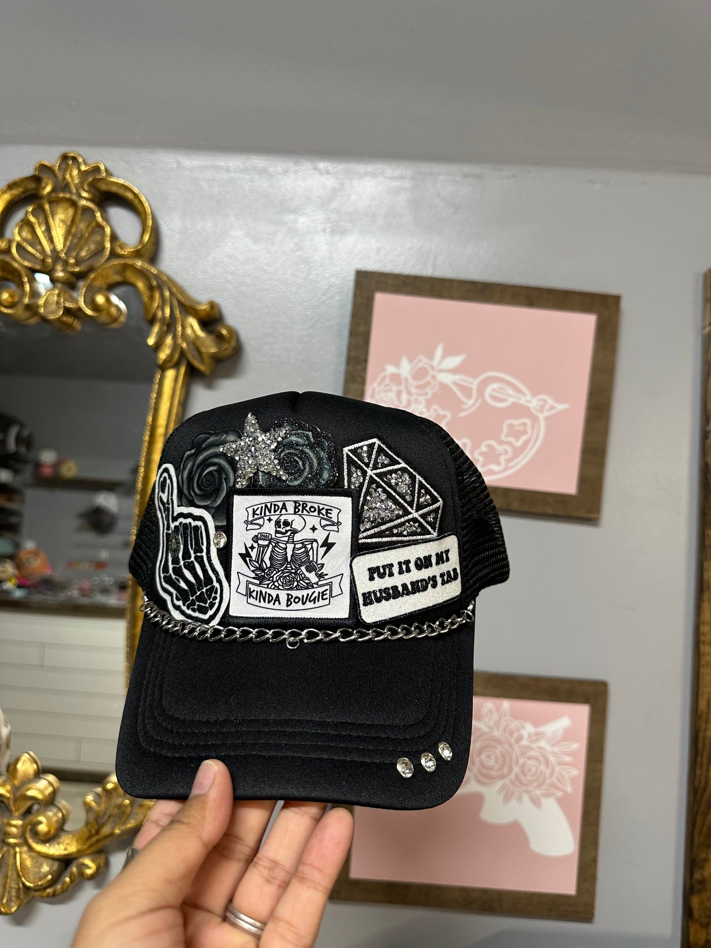 A little Broke a little bougie put it in my husbands tab black Trucker hat