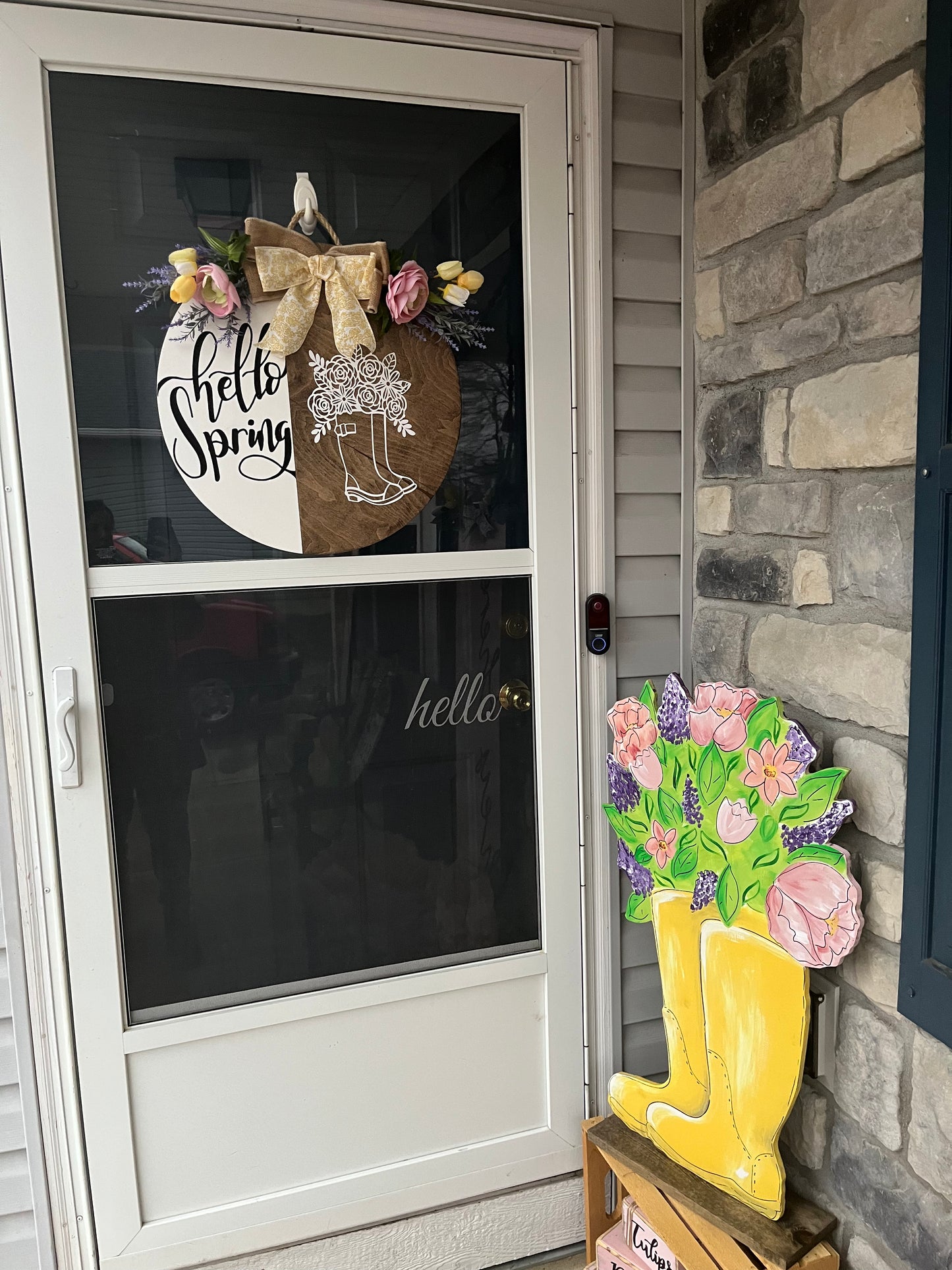 Spring yellow boots with flowers yard art