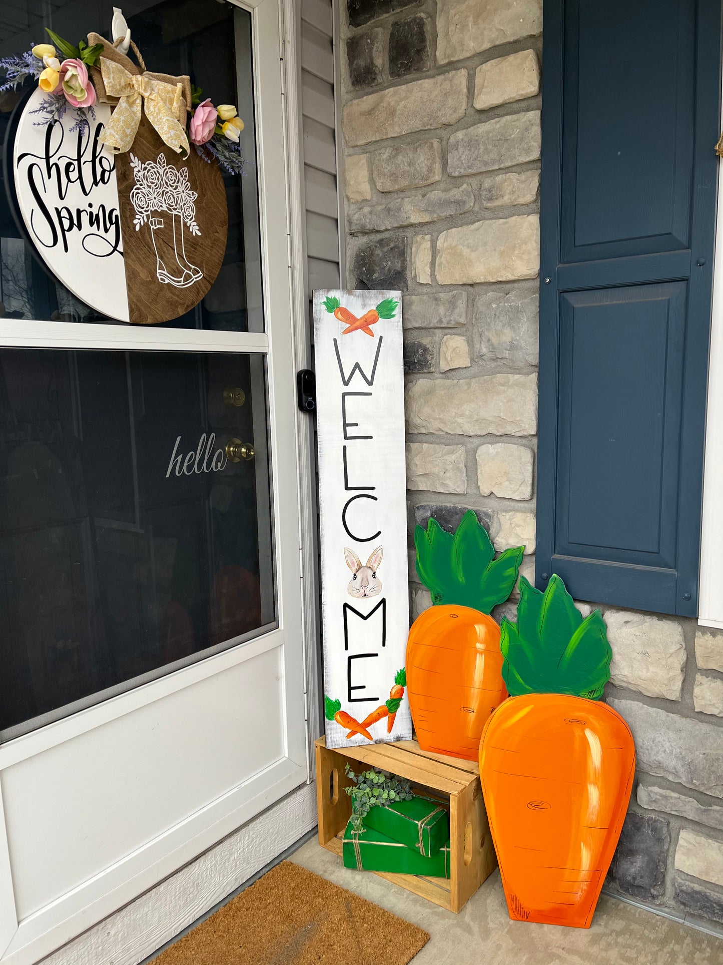 Welcome Easter bunny with carrots welcome sign with a painted bunny